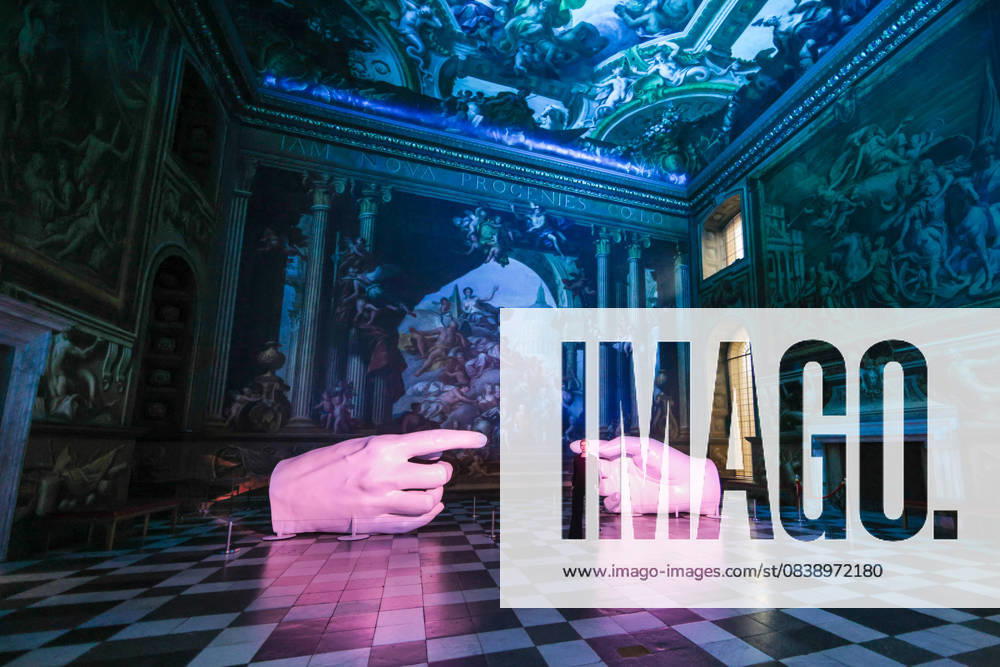 Peter Walker Connection and Identity installations photocall at the Painted Hall, Old Royal Naval College Greenwich, London, UK London, UK. 31th Oct 2025. Staff with Peter Walker s installations Connection and Identity in the Painted Hall at Old Royal Naval College, Greenwich. Identity shows eight illuminated suspended columns, evoking DNA structures, and Connection is a modern re-interpretation of Michelangelos Creation of Adam, replacing the traditionally male hands with casts of womens hands., Credit:Imageplotter Avalon