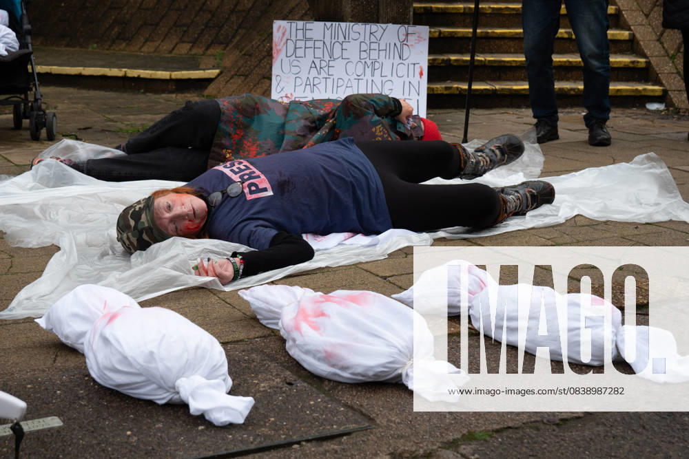 The pro-Palestinian campaign group Gaza Genocide Emergency Committee held a rolling picket outside premises linked to the UK Ministry of Defence, starting at an Army recruitment office and ending with a die-in outside the MoD headquarters. The protest aimed to highlight what the group described as the UK Armed Forces continued participation in the war in Palestine. Glasgow UK - ZUMAs357 20251031_zip_s357_006