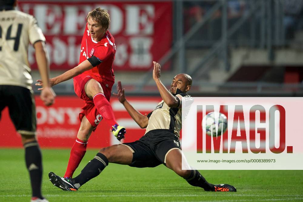(L-R) Luuk de Jong of FC Twente,Luisao of SL Benfica FC Twente Enschede v SL Benfica Lissabon UEFA Champions League play-off 2011 2012 OrangexPicturesxIVx 336198