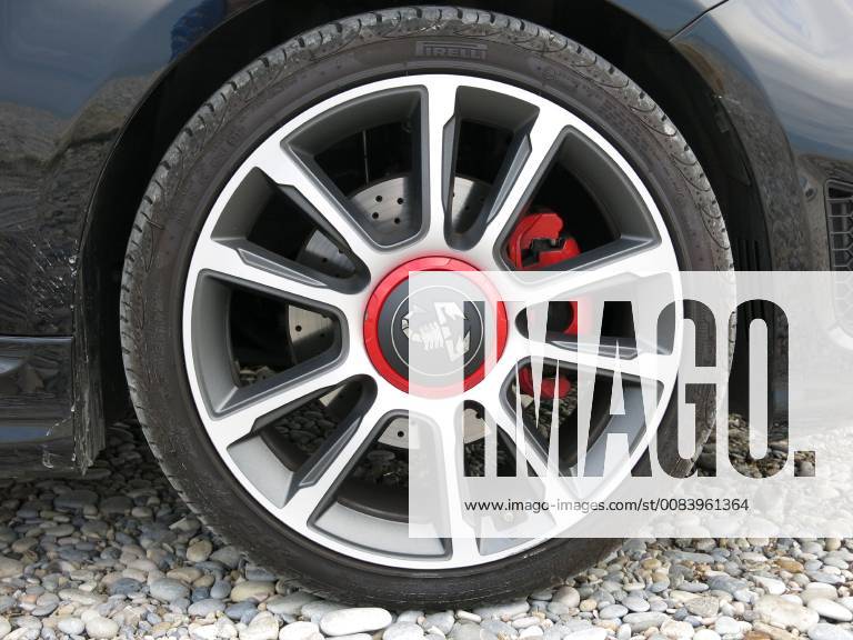 17 inch alloy wheels Alloy wheels in Granturismo 5 V spokes Design with Pirelli tires 205 40 R17 and perforated ventilated disc brakes Caliper painted red on Abarth 595 C Turismo based on Fiat 500C 500 Convertible Color Scorpione Black Metallic Model year 2018 facelift Subcompact car