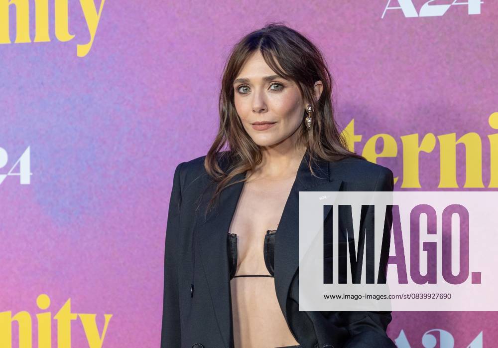 Elizabeth Olsen wearing dress by Givenchy attends Eternity premiere at Regal Union Square in New York, NY on November 8, 2025. Bronx USA - ZUMAr339 20251108_znp_r339_020