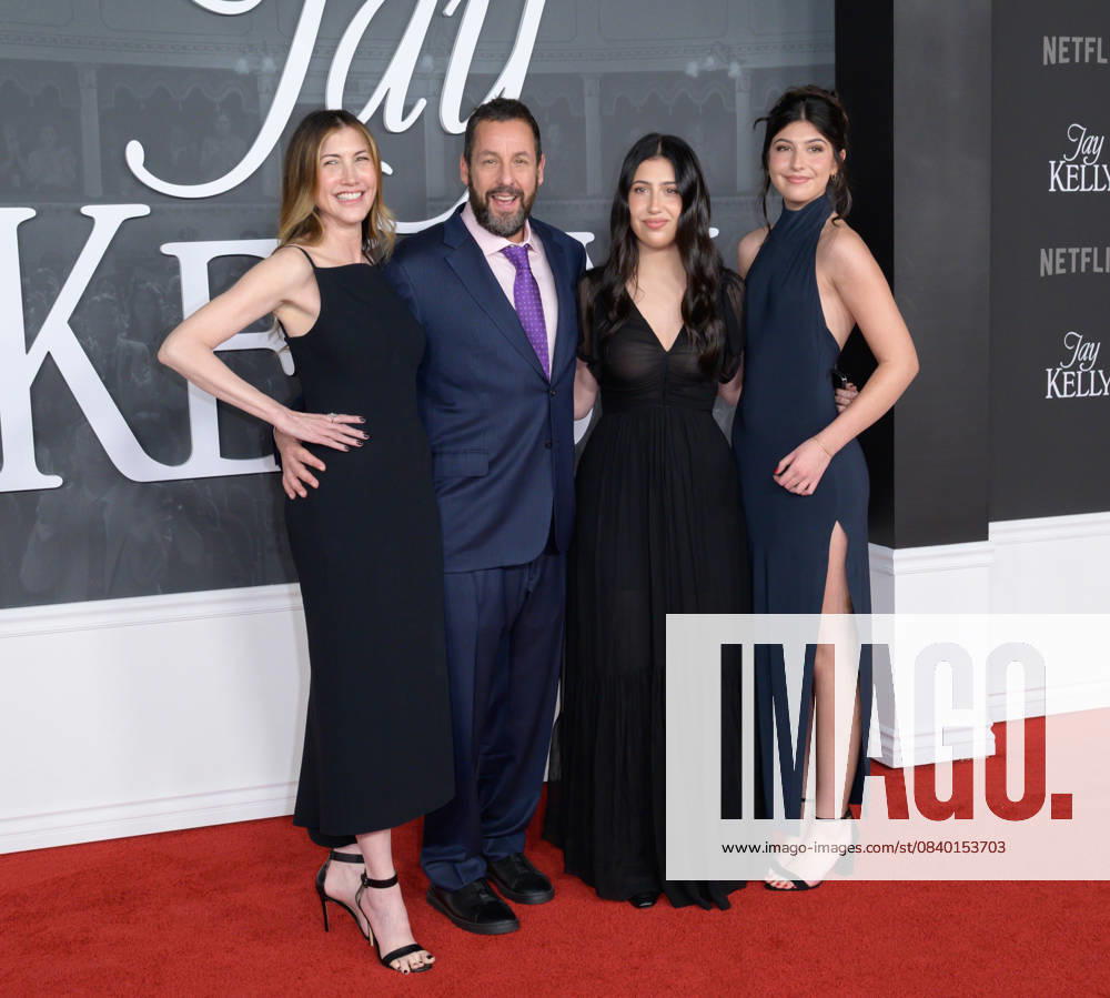 Jay Kelly LA Premiere - Los Angeles, USA LOS ANGELES, USA. November 11, 2025: Jackie Sandler, Adam Sandler, Sadie Sandler & Sunny Sandler at the LA premiere for Netflix s Jay Kelly at the Egyptian Theatre. Los Angeles CA USA