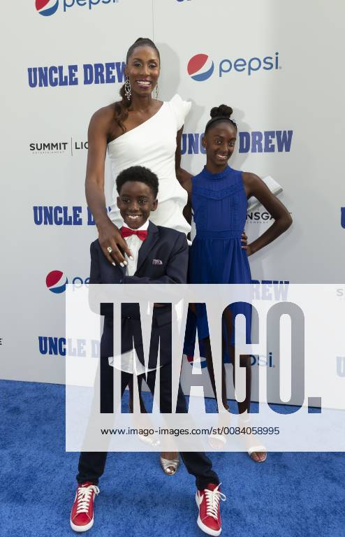 USA: Uncle Drew New York Premiere Lisa Leslie & children Michael Joseph Lockwood II, Lauren Jolie Lockwood attend the Uncle Drew New York Premiere at Alice Tully Hall Lincoln Center New York New York United States Alice Tully Hall Lincoln Center LevxRadin