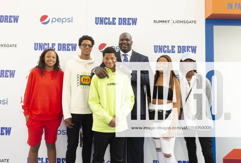 USA: Uncle Drew New York Premiere Shaquille O Neal (C) with his family attends the Uncle Drew New York Premiere at Alice Tully Hall Lincoln Center New York New York United States Alice Tully Hall Lincoln Center LevxRadin
