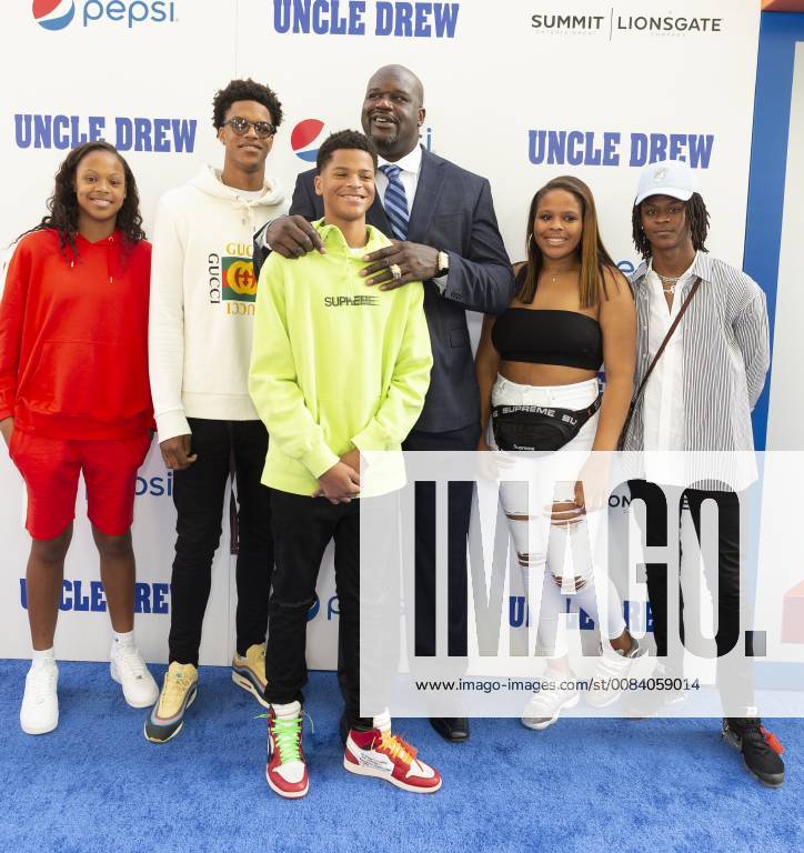 USA: Uncle Drew New York Premiere Shaquille O Neal (C) with his family attends the Uncle Drew New York Premiere at Alice Tully Hall Lincoln Center New York New York United States Alice Tully Hall Lincoln Center LevxRadin