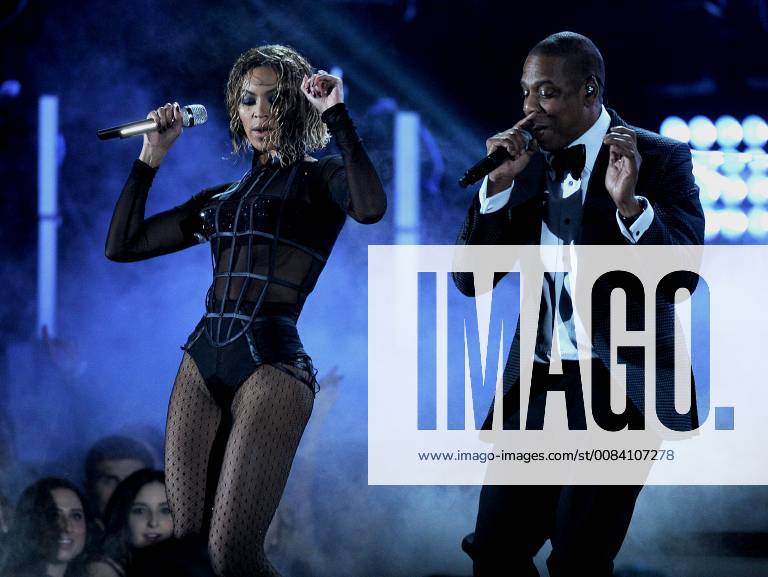 LOS ANGELES, CA - JANUARY 26 : (L-R) Beyonce and Jay-Z perform onstage at The 56th Annual GRAMMY Awards at Staples Center on January 26, 2014 in Los Angeles, California. PGMicelotta MediaPunch