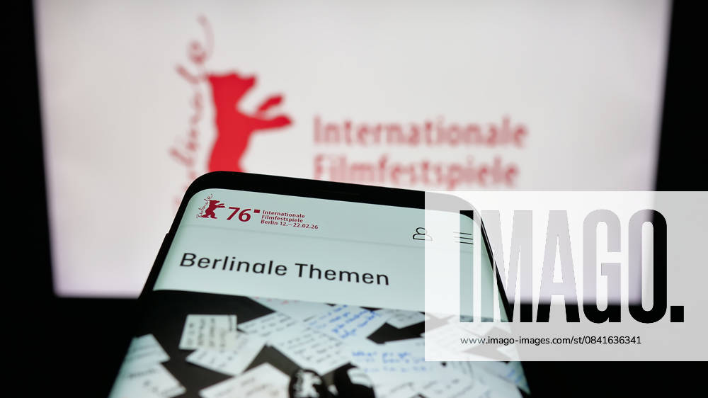 Photo illustration in Germany - 31 Oct 2025 In this photo illustration, a mobile phone with the website of Berlin International Film Festival Berlinale is seen on screen in front of logo. Germany