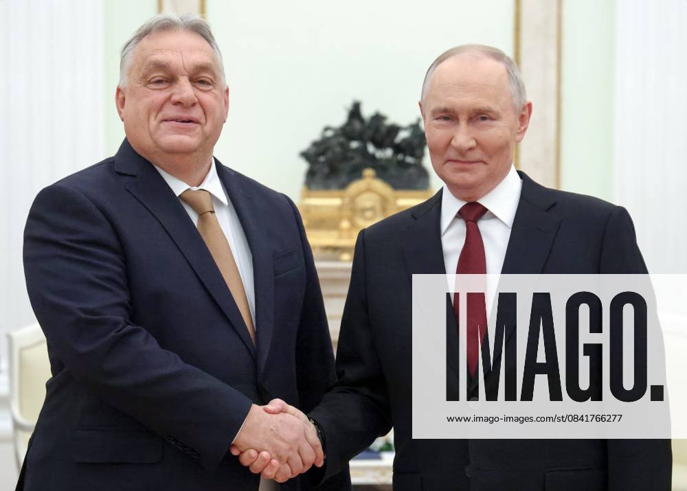 Russia Hungary 9060018 28.11.2025 Hungarian Prime Minister Viktor Orban and Russian President Vladimir Putin shake hands as they pose for photos before a meeting at the Kremlin in Moscow, Russia. Vladimir Gerdo Sputnik Moscow Russia