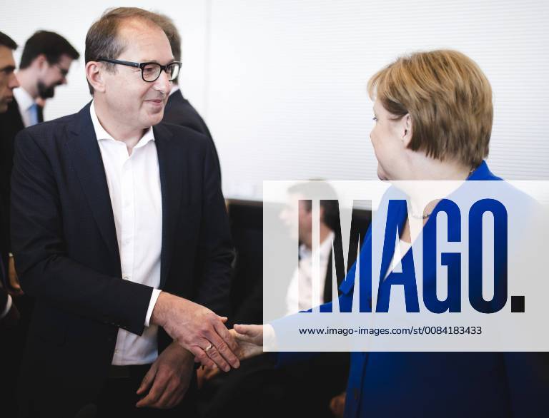 Chancellor Angela Merkel CDU welcomes Alexander Dobrindt CSU before a parliamentary group meeting of the CDU CSU in Berlin 02 07 2018 Berlin Germany