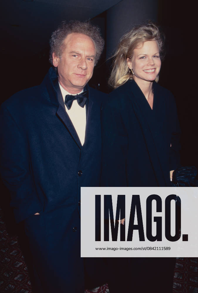 Art Garfunkel and wife Kim Cermak Garfunkel at Liza Minnelli s first performance in Victor Victoria at The Marquis Theatre in New York City on January 7, 1997. Photo