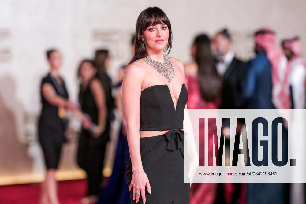 Red Sea Film Festival Opening Ceremony - Jeddah Dakota Johnson walks the red carpet as she arrives to the opening ceremony of the 5th edition of the Red Sea Film Festival in Jeddah, Saudi Arabia, on December 4, 2025. Photo by Balkis Press ABACAPRESS.COM Jeddah Saudi Arabia