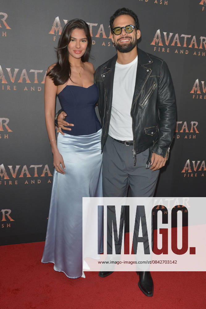 MIAMI, FLORIDA - DECEMBER 12: Sheynnis Palacios and Carlos Gomez attend the Miami Special Screening of Avatar: Fire and Ash at AMC Sunset Place 24 in Miami, Florida on December 12, 2025.