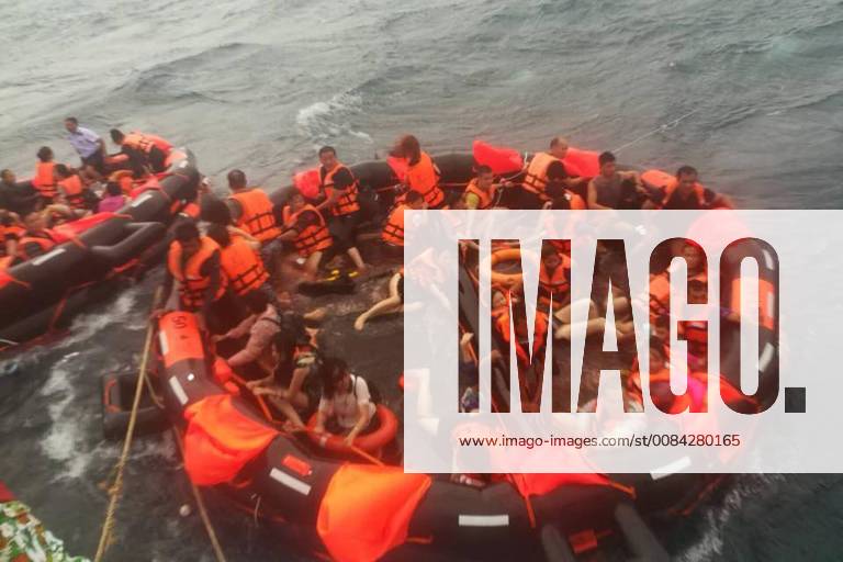 (180706) -- PHUKET, July 6, 2018 () -- Rescued tourists are seen on life rafts near the island of Phuket, Thailand, July 5, 2018. Until 8:30 p.m. local time (1330 GMT) Thursday, the majority of 133 passengers on two boats overturned by rough seas in southern Thailand were saved, but the Thai authority cannot confirm all of them are saved now, said Chinese Consulate-General in Songkhla on Thursday.() (srb) THAILAND-PHUKET-ACCIDENT Xinhua