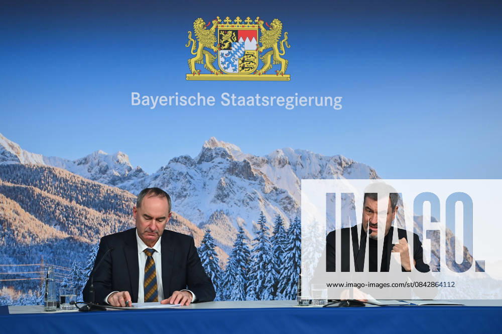 From left Hubert AIWANGER Free Voters, Bavarian Minister of Economic Affairs, Markus SOEDER State Premier of Bavaria and CSU Chairman in front of a wintry Alpine backdrop, press conference of the Bavarian State Government after the cabinet meeting on 16 12 2025 in the Prinz Carl Palais in Munich