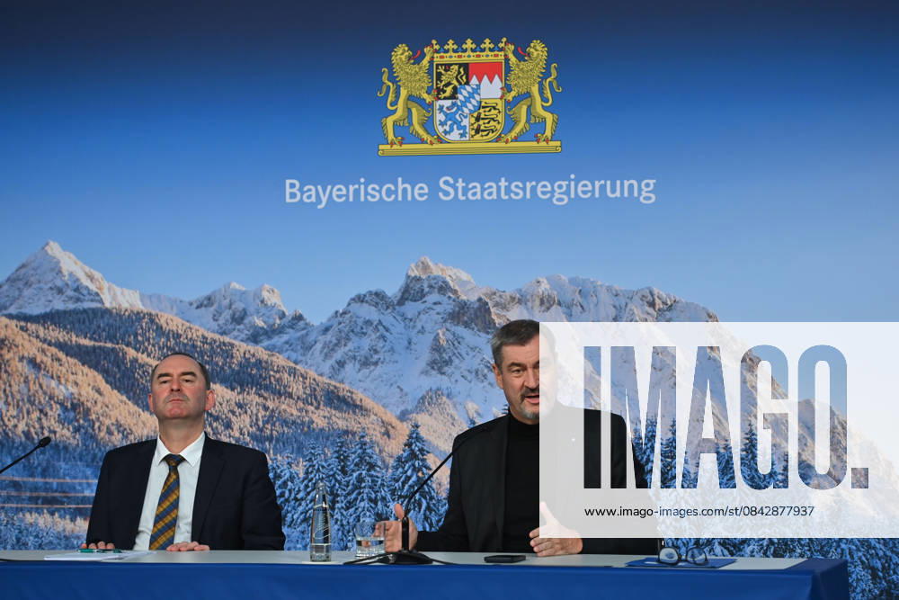 From left Hubert AIWANGER Free Voters, Bavarian Minister of Economic Affairs, Markus SOEDER State Premier of Bavaria and CSU Chairman in front of a wintry Alpine backdrop, press conference of the Bavarian State Government after the cabinet meeting on 16 12 2025 in the Prinz Carl Palais in Munich