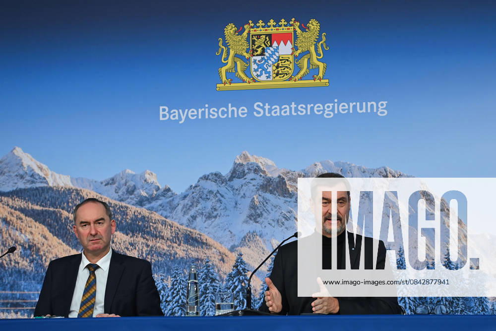 From left Hubert AIWANGER Free Voters, Bavarian Minister of Economic Affairs, Markus SOEDER State Premier of Bavaria and CSU Chairman, in front of a wintery Alpine backdrop, press conference of the Bavarian State Government after the cabinet meeting on 16 12 2025 in the Prinz Carl Palais in Munich