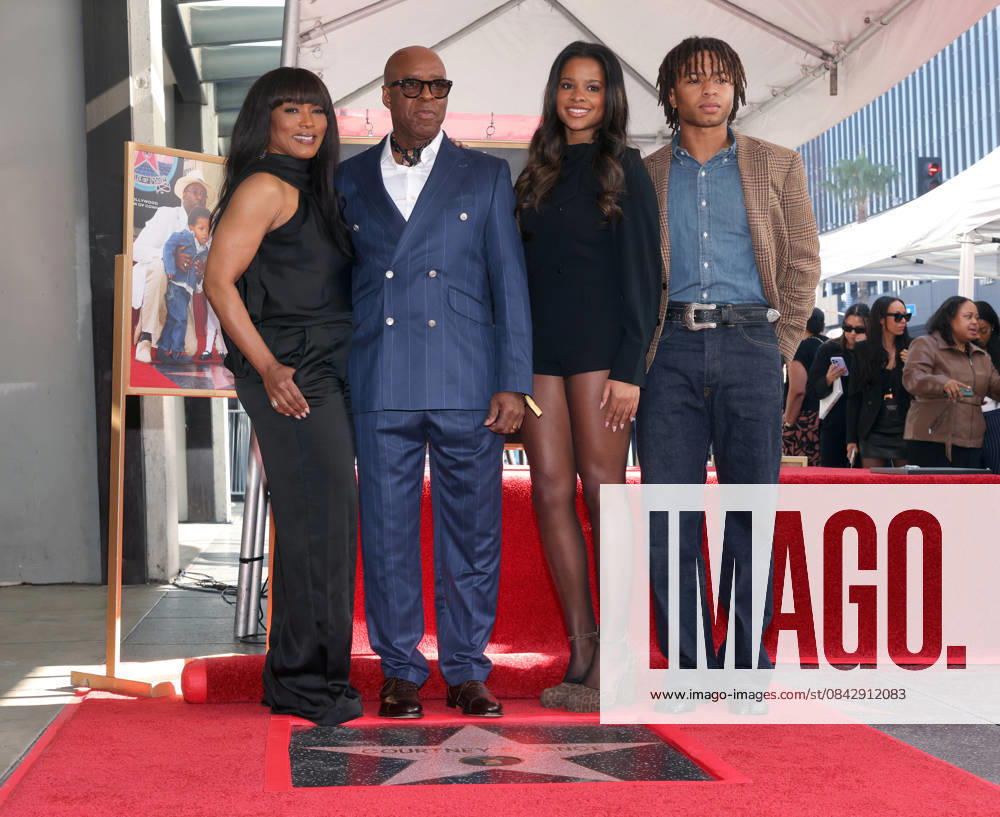 Angela Bassett, Courtney B. Vance, Bronwyn Golden Vance and Slater Josiah Vance attend an unveiling ceremony honoring Courtney B. Vance with the 2,831st star on the Hollywood Walk of Fame in Los Angeles on Tuesday, December 16, 2025. LAP20251216829 GREGxGRUDT