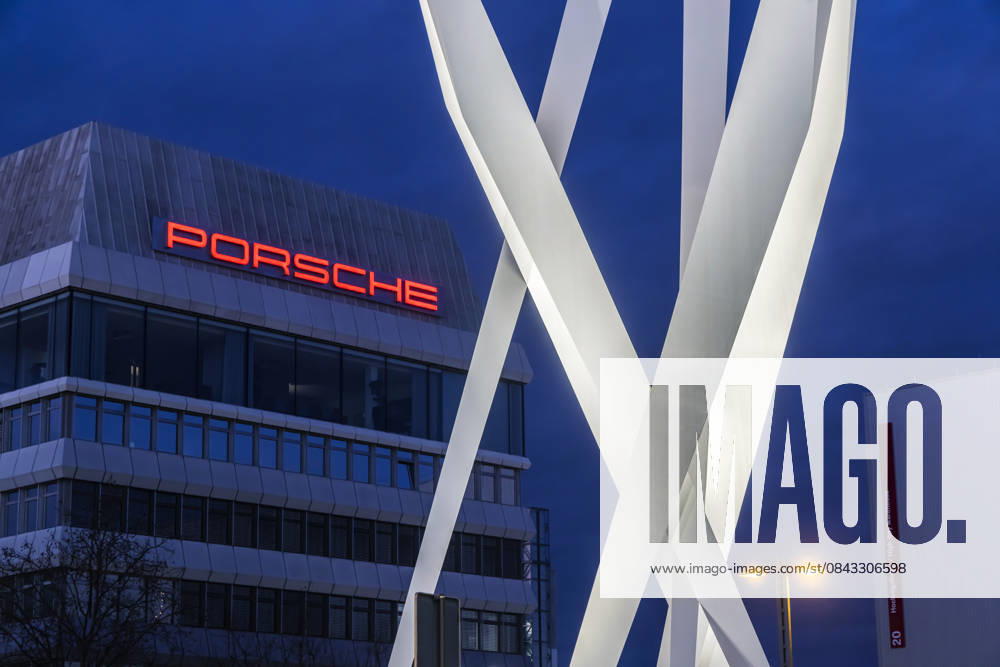 Porscheplatz in Zuffenhausen in the evening Between the Porsche Museum and headquarters, the artwork Inspiration 911 by Gerry Judah Three steles, each up to 24 meters high, present a Porsche 911 19 12 2025 Stuttgart, Baden Württemberg, Germany