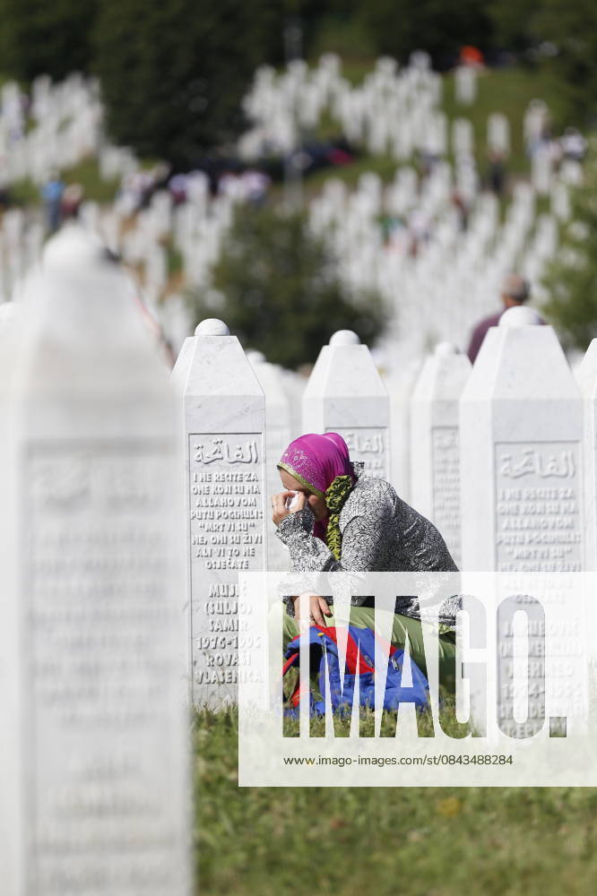 71 victims of Srebrenica genocide will be buried in Potocari SREBRENICA, BOSNIA AND HERZEGOVINA - JULY 11: A Bosnian woman grieves during a funeral ceremony of newly identified 71 Srebrenica genocide victims, to mark the 22nd anniversary of the Srebrenica genocide, at Potocari Memorial Center in Potocari village of Srebrenica, Bosnia and Herzegovina on July 11, 2017. Serbian army led by Ratko Mladic carried out a genocide and killed more than 8 000 Bosnian in Srebrenica on 11th July 1995. Bosna Hersek World. Editorial use only. Please get in touch for any other usage.