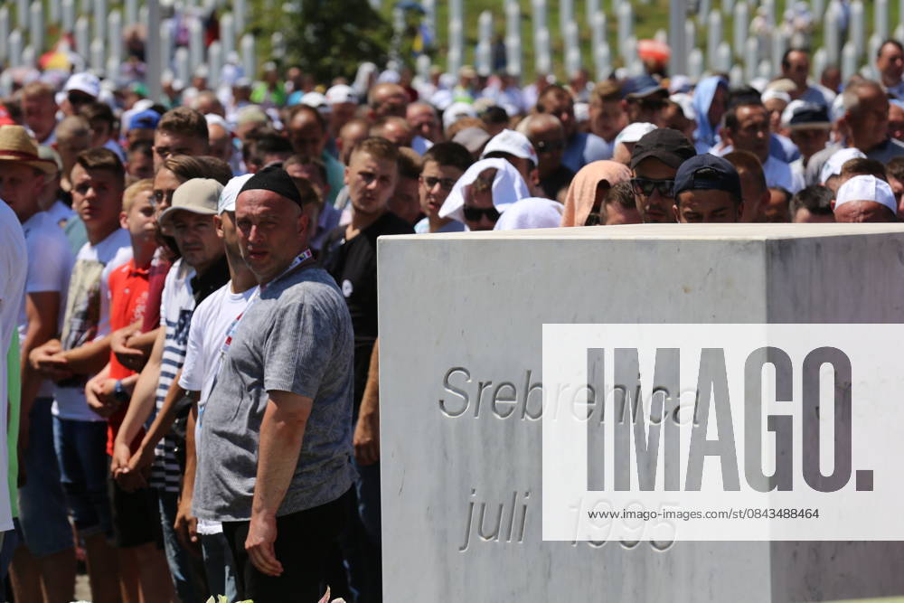 71 victims of Srebrenica genocide will be buried in Potocari SREBRENICA, BOSNIA AND HERZEGOVINA - JULY 11 : People pray ahead of funeral ceremony of newly identified 71 Srebrenica genocide victims, to mark the 22nd anniversary of the Srebrenica genocide, at Potocari Memorial Center in Potocari village of Srebrenica, Bosnia and Herzegovina on July 11, 2017. Serbian army led by Ratko Mladic carried out a genocide and killed more than 8 000 Bosnian in Srebrenica on 11th July 1995. Bosna Hersek World. Editorial use only. Please get in touch for any other usage.
