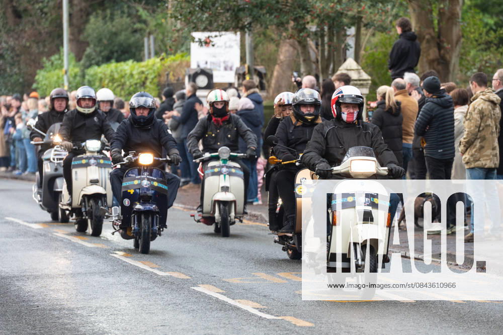 Scooter riders lead the funeral procession of Gary Mani Mounfield, Bass Player in the Stone Roses and Primal Scream, makes its way through Heaton Moor, Stockport on 22 December 2025. 22 12 2025 Stockport Greater Manchester England Heaton Moor