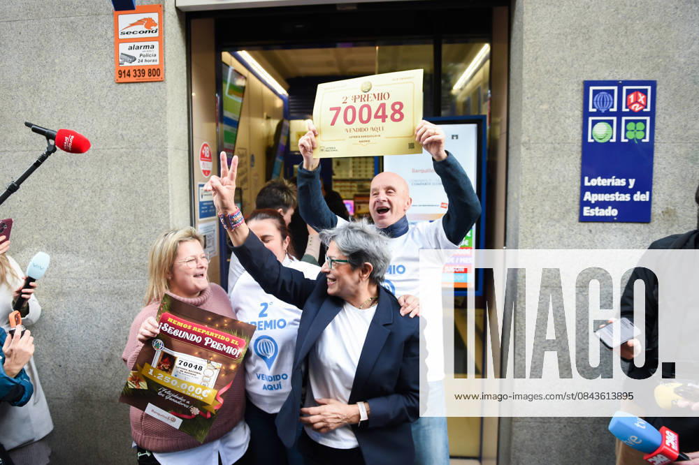 Winners of the Second Prize of the Extraordinary Draw of the Christmas Lottery 2025 celebrate their luck Employees of the administration located in the street of Barquillo 10, celebrate that they have sold the number 70048 corresponding to the Second Prize of the Extraordinary Draw of the Christmas Lottery 2025, on December 22, 2025, in Madrid Spain The 2025 Extraordinary Christmas Lottery Draw consists of 198 series and each series has 100,000 tickets The total amount of the issue is 3,960 million euros and 70 of the issue is destined to prizes 2,772 million euros Each series distributes 14 million euros in prizes. 14 million euros in prizes and a total of 30,301,920 prizes are distributed during a draw that lasts approximately four hours