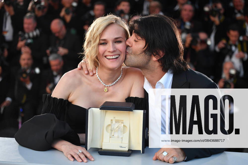70th Cannes Film Festival - Award Winners photocall CANNES, FRANCE - MAY 28: German actress Diane Kruger (L) poses with her director Fatih Akin during the Award Winners photocall after she won the Best Actress Prize for Aus dem Nichts (In the Fade) at the 70th annual Cannes Film Festival in Cannes, France on May 28, 2017. Provence-Alpes-Cote d Azur France. Editorial use only. Please get in touch for any other usage.