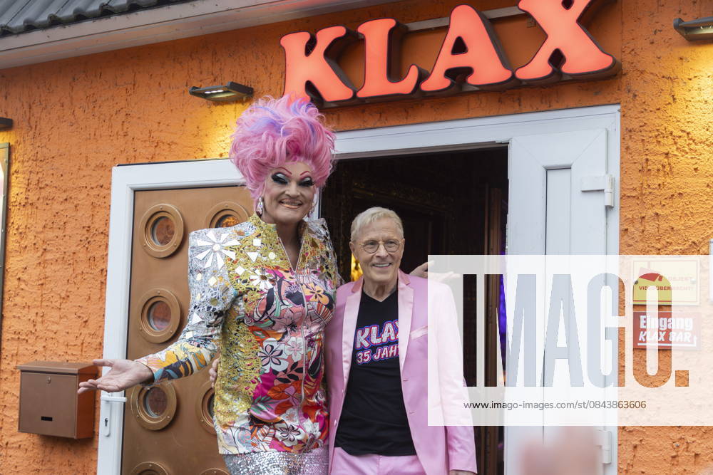 The Dresden multi-entrepreneur Wolfgang Wolle Förster right welcomes drag queen Olivia Jones left, travesty art figure of Oliver Knöbel, born November 21, 1969 in front of the Nachtbar Klax in Dresden Olivia Jones is star guest of the celebration on the occasion of the 35th anniversary of the Nachtbar Klax in Dresden