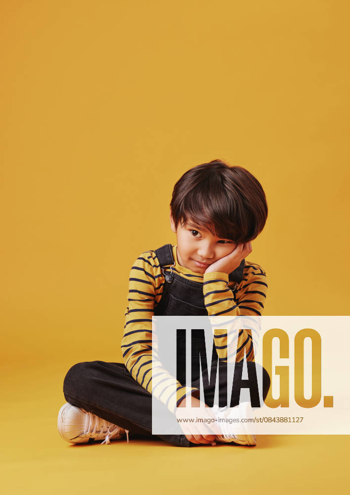 Bored, lonely and thinking with Asian boy on yellow background, isolated in studio for development. ADHD, depression or sadness and child on floor with mockup space for curiosity or problem solving Bored, lonely and thinking with Asian boy on yellow background, isolated in studio for development. ADHD, depression or sadness and child on floor with mockup space for curiosity or problem solving., model released, , 62733662.jpg RECORD DATE NOT STATED