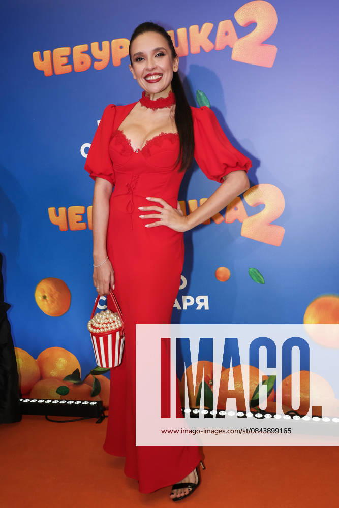 RUSSIA, MOSCOW - DECEMBER 24, 2025: Actress Olga Dibtseva poses with children on the red carpet during the premiere of the family comedy Cheburashka 2 by Dmitry Dyachenko at the KARO 11 Oktyabr cinema on Novy Arbat Street (New Arbat Avenue). Valery Sharifulin TASS 86692956