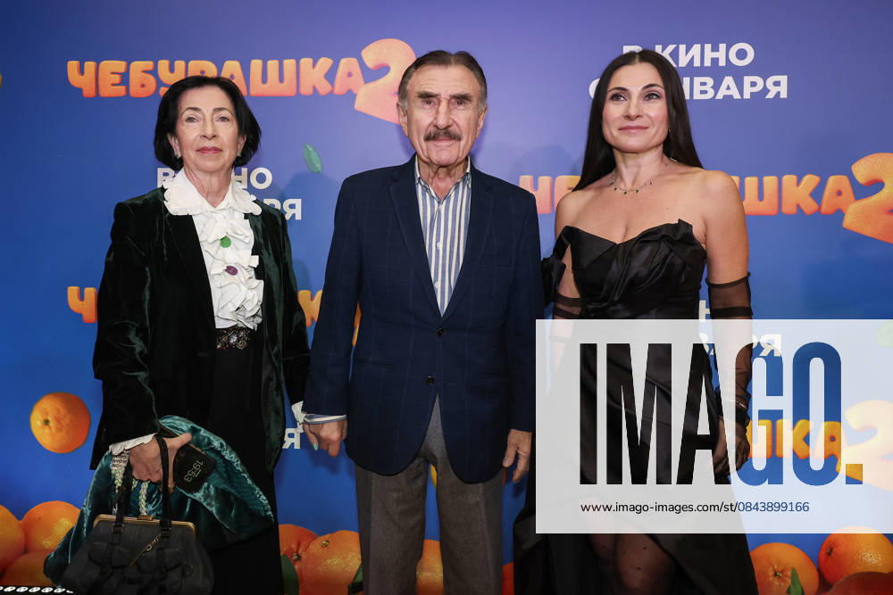 RUSSIA, MOSCOW - DECEMBER 24, 2025: Actor Leonid Kanevsky poses with his wife Anna Berezina (L) and daughter Natalya Kanevskaya on the red carpet during the premiere of the family comedy Cheburashka 2 by Dmitry Dyachenko at the KARO 11 Oktyabr cinema on Novy Arbat Street (New Arbat Avenue). Valery Sharifulin TASS 86692958