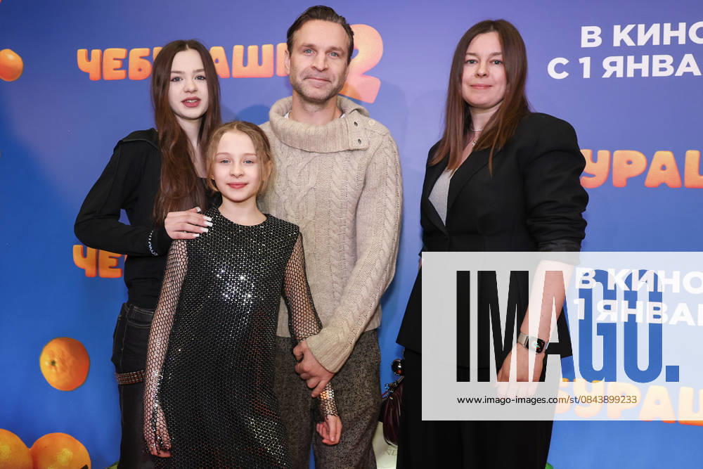 RUSSIA, MOSCOW - DECEMBER 24, 2025: Actor Viktor Dobronravov poses with his family on the red carpet during the premiere of the family comedy Cheburashka 2 by Dmitry Dyachenko at the KARO 11 Oktyabr cinema on Novy Arbat Street (New Arbat Avenue). Valery Sharifulin TASS 86692669