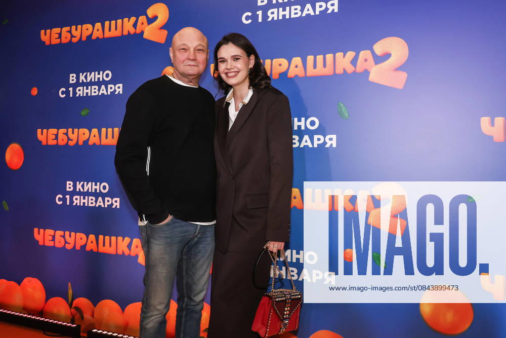 RUSSIA, MOSCOW - DECEMBER 24, 2025: Actor, producer, director Sergei Ginzburg poses with his wife Olga Vinichenko on the red carpet during the premiere of the family comedy Cheburashka 2 by Dmitry Dyachenko at the KARO 11 Oktyabr cinema on Novy Arbat Street (New Arbat Avenue). Valery Sharifulin TASS 86692120