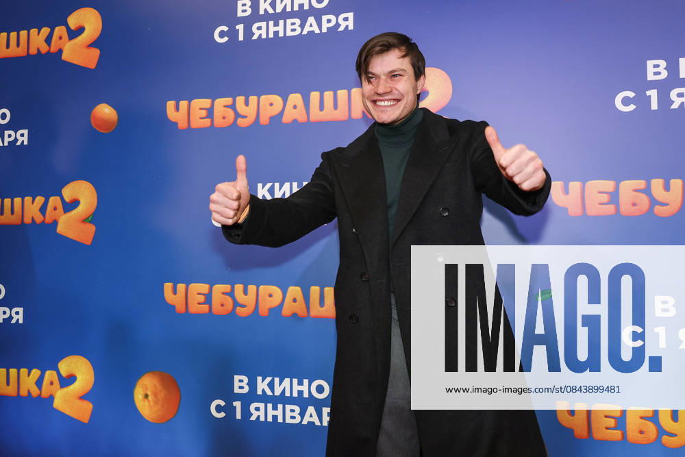 RUSSIA, MOSCOW - DECEMBER 24, 2025: Actor Oleg Gaas poses with children on the red carpet during the premiere of the family comedy Cheburashka 2 by Dmitry Dyachenko at the KARO 11 Oktyabr cinema on Novy Arbat Street (New Arbat Avenue). Valery Sharifulin TASS 86692962