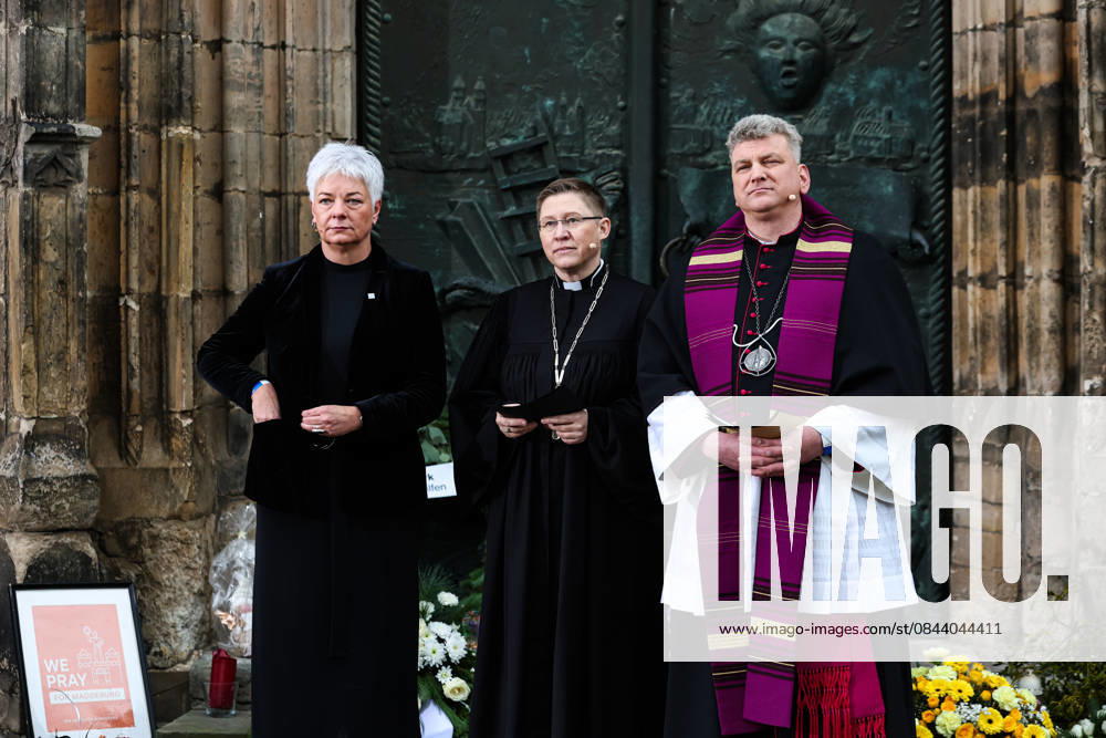 Mayor Regina Dolores Stieler Hinz, Regional Bishop Bettina Schlauraff, Cathedral Pastor Daniel Rudloff stand in front of St. Johns Church at the memorial site Memorial event in Magdeburg Saxony Anhalt , Churches and the state capital invite you to a memorial service in