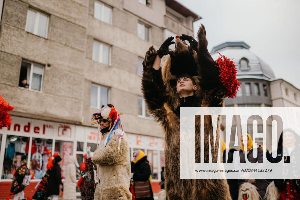 Winter Traditions and Customs Festival in Vatra Dornei, Romania Vatra Dornei, Suceava, Romania, December 29, 2025: Participants wearing traditional costumes take part in the Winter Traditions and Customs Festival. The annual event celebrates Romanian folklore through ancient winter rituals, masks, traditional music, and dances, bringing together performers from across the region.