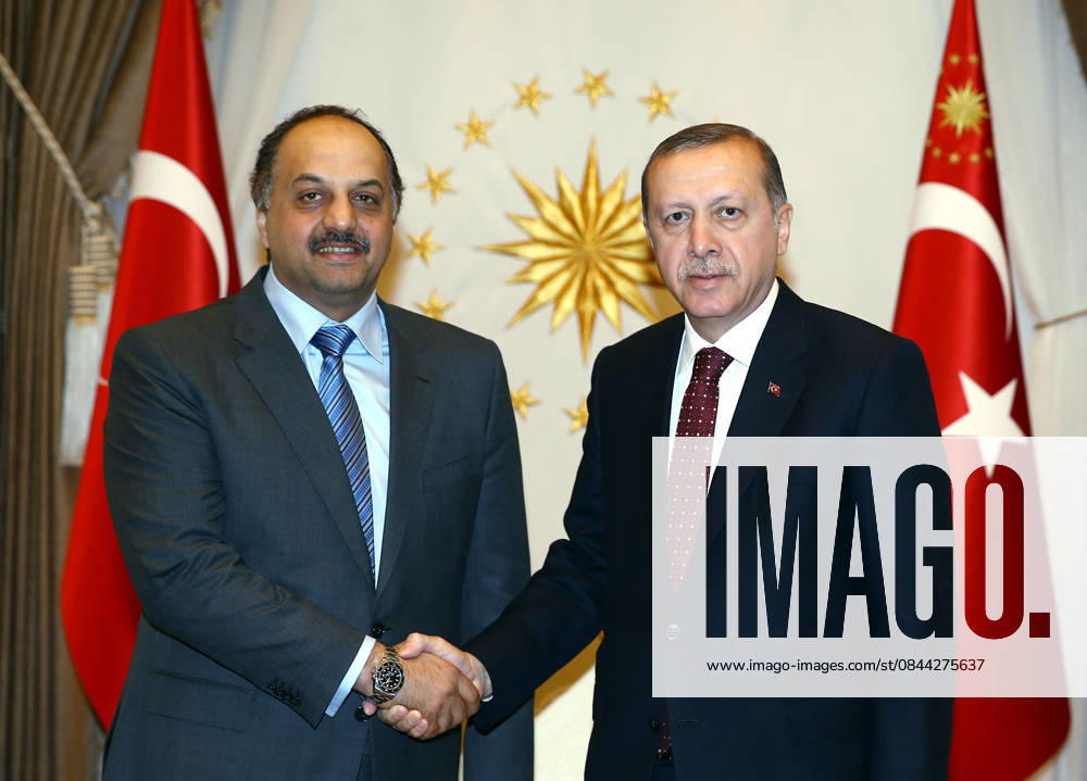 Turkish President Erdogan meets with Defense Minister of Qatar ANKARA, TURKEY - MAY 5: President of Turkey, Recep Tayyip Erdogan (R) and Minister of State for Defense of Qatar, Khalid bin Mohammad Al Attiyah (L) shake each other s hands ahead of their meeting, at Presidential Complex, in Ankara, Turkey on May 5, 2016. Ankara Turkey. Editorial use only. Please get in touch for any other usage.
