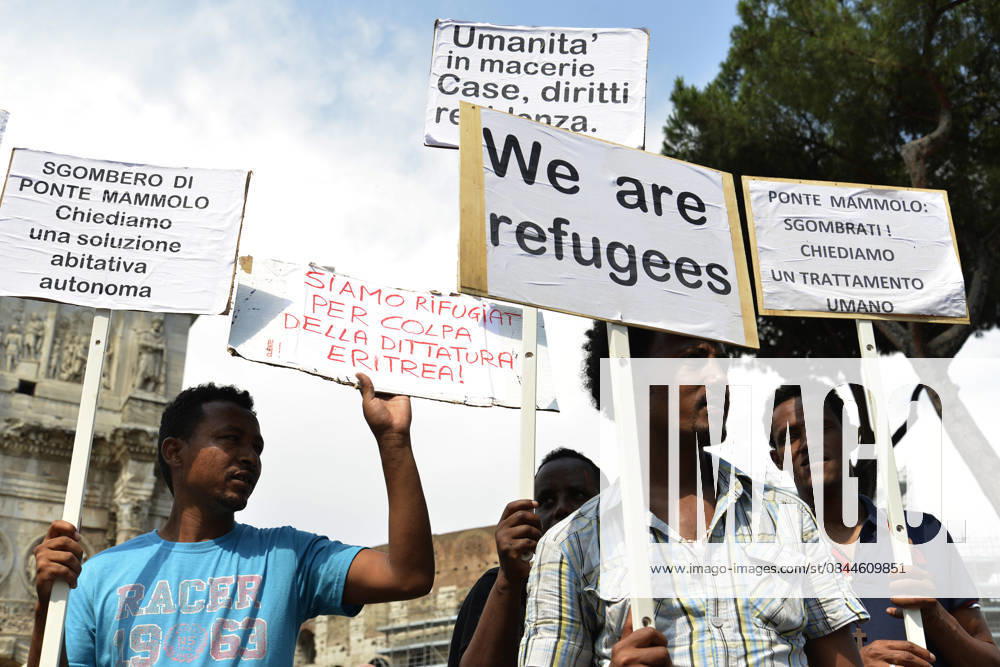 World Refugee Days in Rome ROME, ITALY - JUNE 20 : Refugees living in Rome and members of the other trade unions gather outside Colosseum in Rome, Italy on June 20, 2015. World Refugee Day, observed June 20th each year, is dedicated to raising awareness of the situation of refugees throughout the world. Roma Italy. Editorial use only. Please get in touch for any other usage.