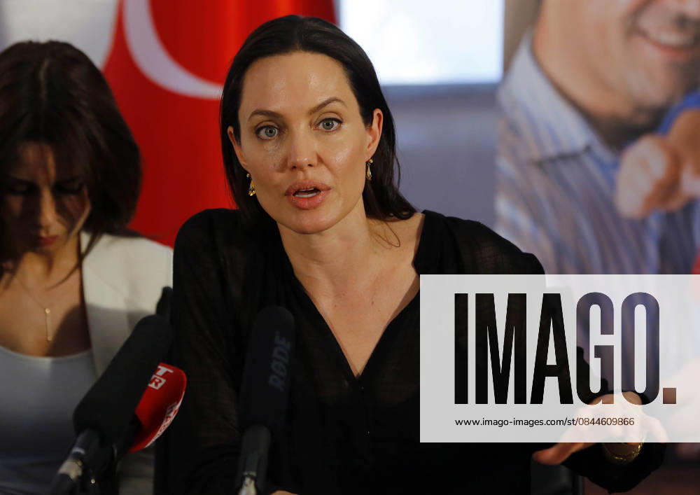 Antonio Guterres and Angelina Jolie visit refugees MARDIN, TURKEY - JUNE 20 : U.N. Special Envoy for Refugees Angelina Jolie and U.N. High Commissioner for Refugees Antonio Guterres (not seen) attend a press conference after visiting Kurdish, Arab, Turkmen and Ezidi refugees living in Midyat Refugee Camp on World Refugee Day in Turkey s southeastern province of Mardin on June 20, 2015. Mardin Turkey. Editorial use only. Please get in touch for any other usage.