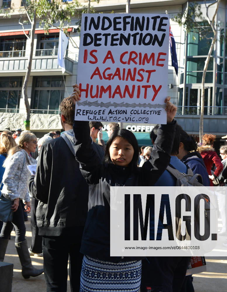 World Refugee Day in Melbourne MELBOURNE, AUSTRALIA - JUNE 21: People hold banners as they gather to mark World Refugee Day in Melbourne, Australia on June 21, 2015. Queensland Australia. Editorial use only. Please get in touch for any other usage.