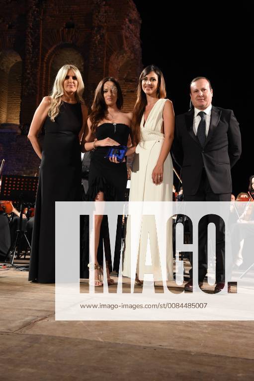 Taormina: Cinematographic Nations Award Evening. Photo: Tiziana Rocca with Gessica Notaro and Valeria Altobelli and Alberto Polini