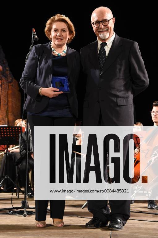 Taormina: Cinematographic Nations Award Evening. Photo: Mayor of Taormina Mario Bolognari rewards Caterina Chinnici