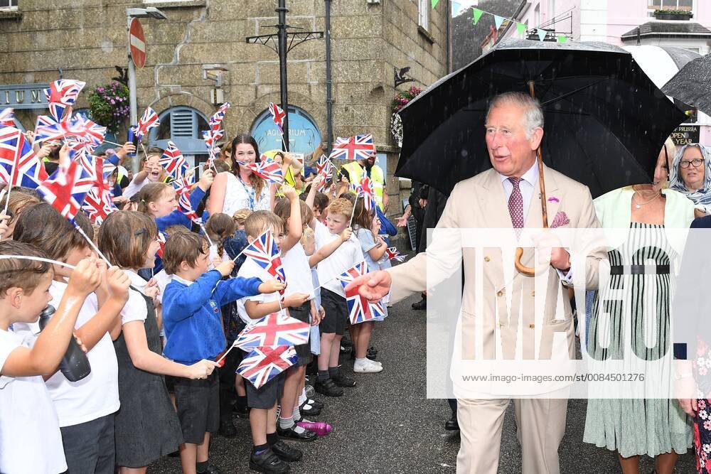 . 16 07 2018. Fowey, United Kingdom. Prince Charles the Duchess of Cornwall visit Cornwall. The Duke and Duchess of Cornwall visit the celebration of Fowey festival meeting local businesses, representatives from Fowey gig club and members of the RNLI on Fowey Quay. xAndrewxParsonsx xi-Imagesx IIM-18220-0008