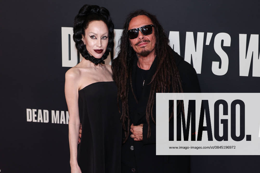 Los Angeles Premiere Of Row K Entertainment s Dead Man s Wire LOS ANGELES, CALIFORNIA, USA - JANUARY 07: Evis Xheneti Shaffer and husband James Shaffer of American nu metal band Korn arrive at the Los Angeles Premiere Of Row K Entertainment s Dead Man s Wire held at AMC The Grove 14 on January 7, 2026 in Los Angeles, California, United States., Credit:Xavier Collin Avalon United States, California, Los Angeles, AMC The Grove 14
