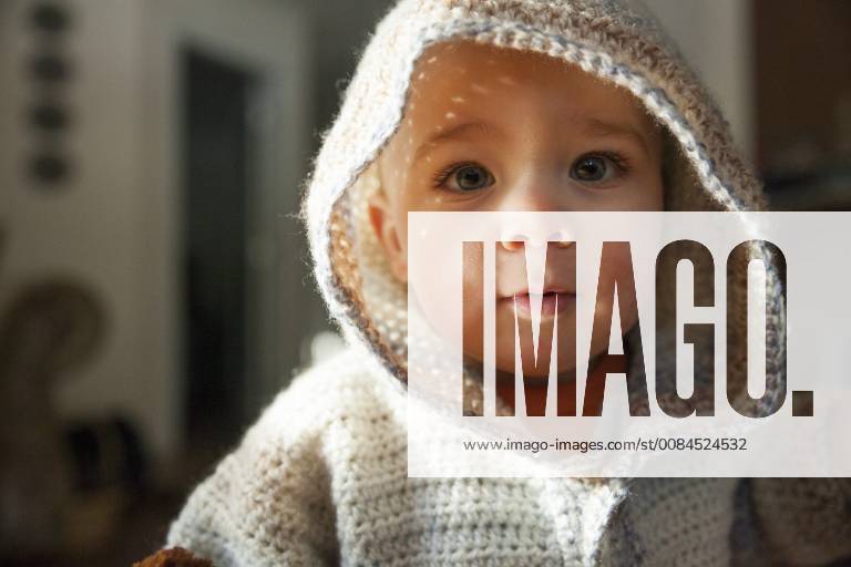 Headshot portrait of baby boy in hooded knit sweater, Surrey british Columbia Canada KICH016112 model released Symbolfoto