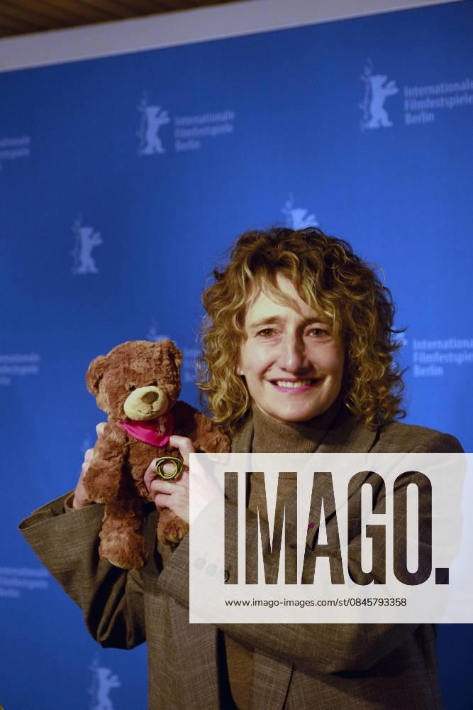 Director Tricia Tuttle with the Berlinale plush bear during a program press conference for the 76 Berlin Int