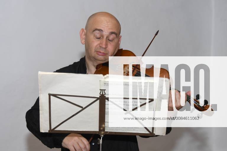 Violinist Ilja Korol practices in the Klostersaal Traunkirchen for his performance in the evening in front of an audience of Salzkammergut Festwochen Gmunden This picture shows the well-known international Russian violin specialist on the background of ancient music Ilja Korol For his musical achievements he was awarded Austrian citizenship