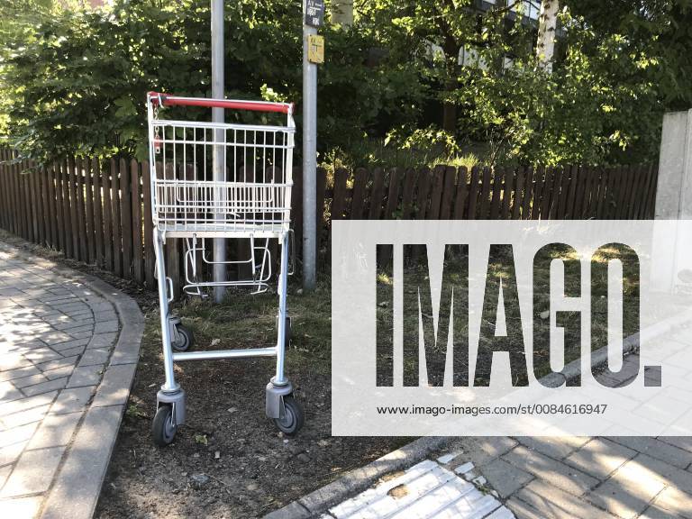 Parked shopping cart on a street 22 06 2018