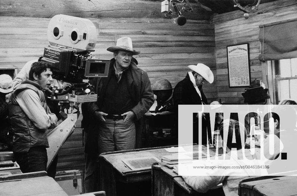 The Cowboys, Warner Bros. 1971. Director, Mark Rydell, and John Wayne during filming.