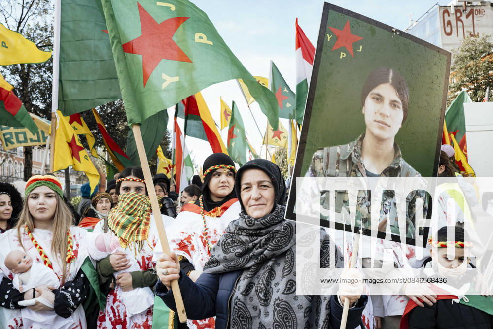 Rally in support of the Revolution in Rojava - Toulouse Rally in support of International Solidarity for Rojava asking action against the massacre of the Kurds, in Toulouse, France, on January 31, 2026. A woman in the foreground, Ms. Atac, holding the YPJ flag, Women s Protection Units, in one hand and a poster of a female warrior in the other, with women behind her wearing white dresses stained with blood on their hands, some with babies in their arms. Rally in support of the revolution in Rojava, a semi-autonomous region in northeastern Syria, which is under attack by the new regime seeking to extend its authority over Kurdish-administered territories. Photo by Patricia Huchot-Boissier ABACAPRESS.COM TOULOUSE OCCITANIE France
